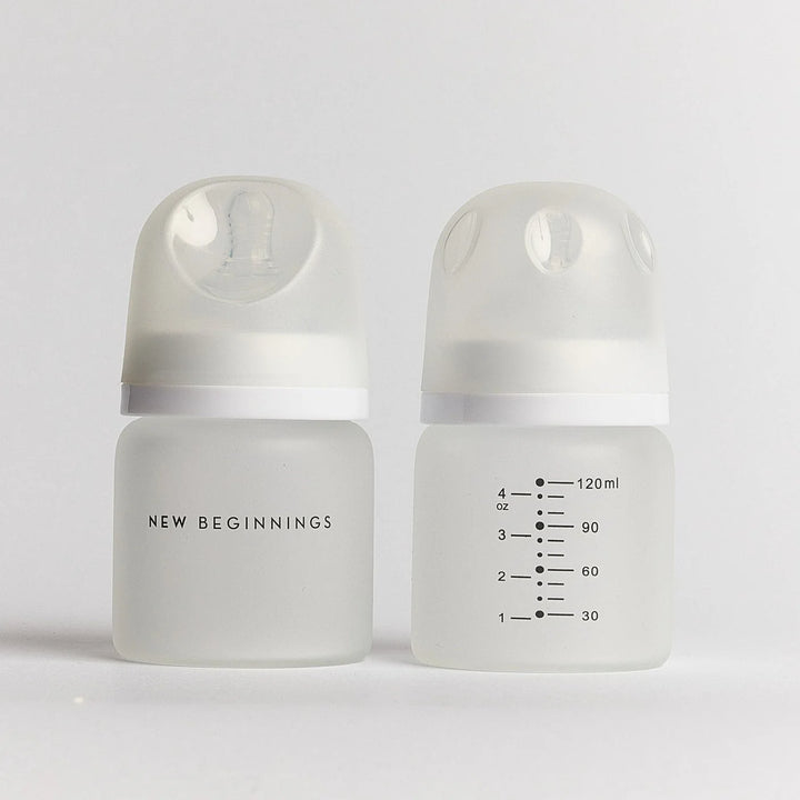 NEW BEGINNINGS GLASS BOTTLE 120ML TWIN SILICONE OUTER