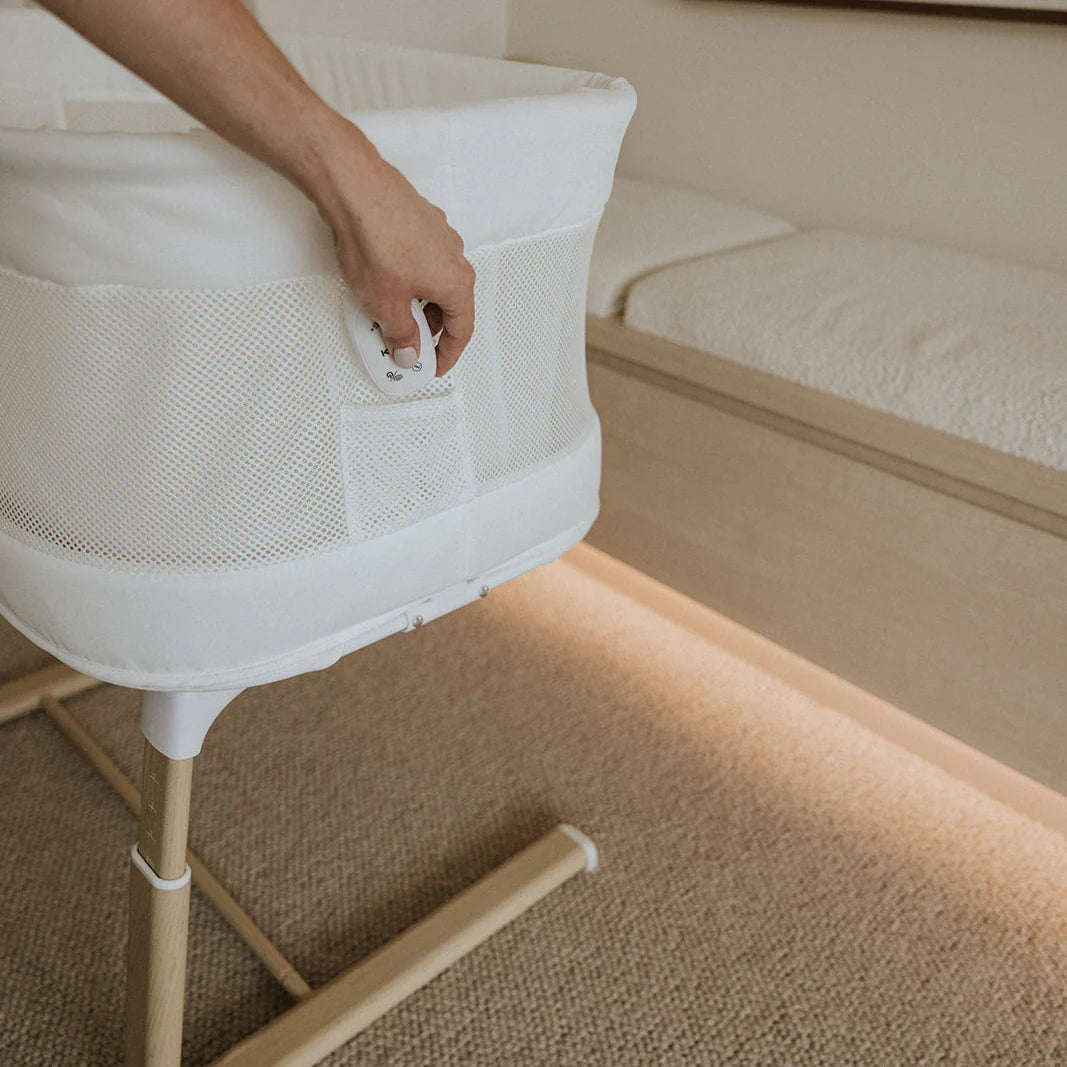 BabyRest Swan Smart Bassinet. White/Natural – Whole Bubs