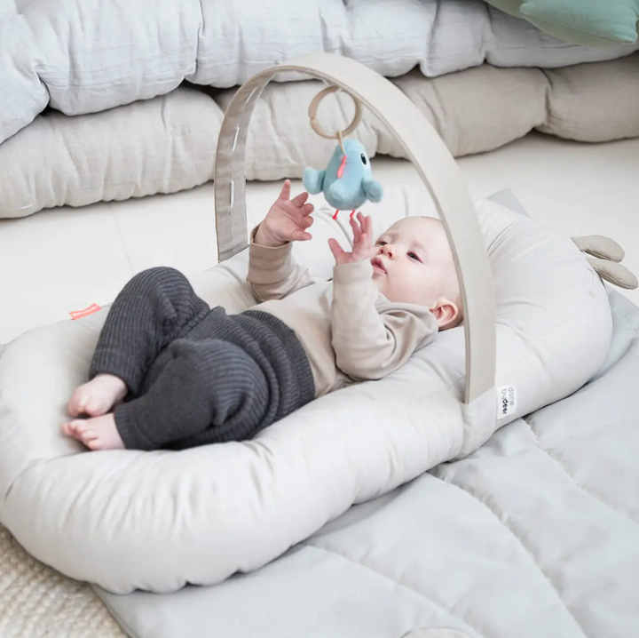 Done by Deer Cozy Lounger with Activity Arch – Sand