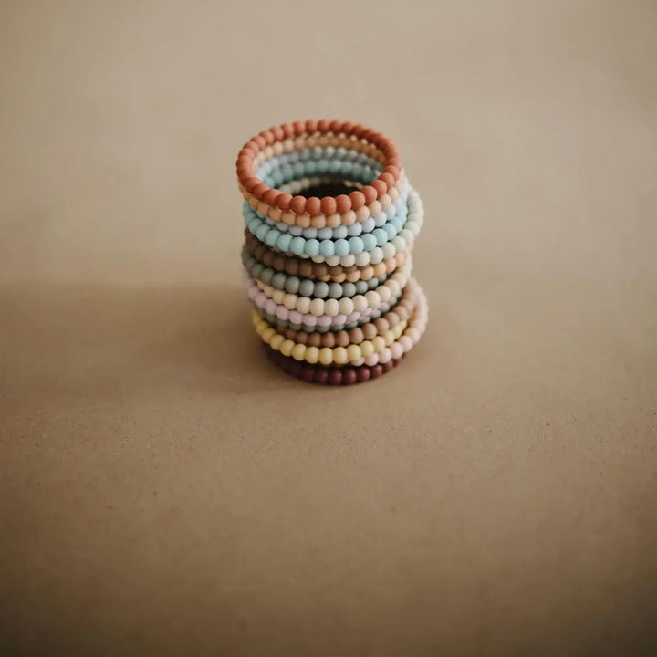 Mushie Bracelet Teether LINEN PEONY PALE PINK