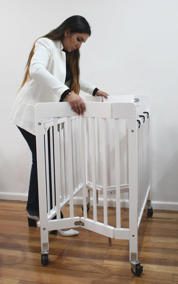 Baby Inc Stowaway Foldable Wooden Cot-White(N9608)