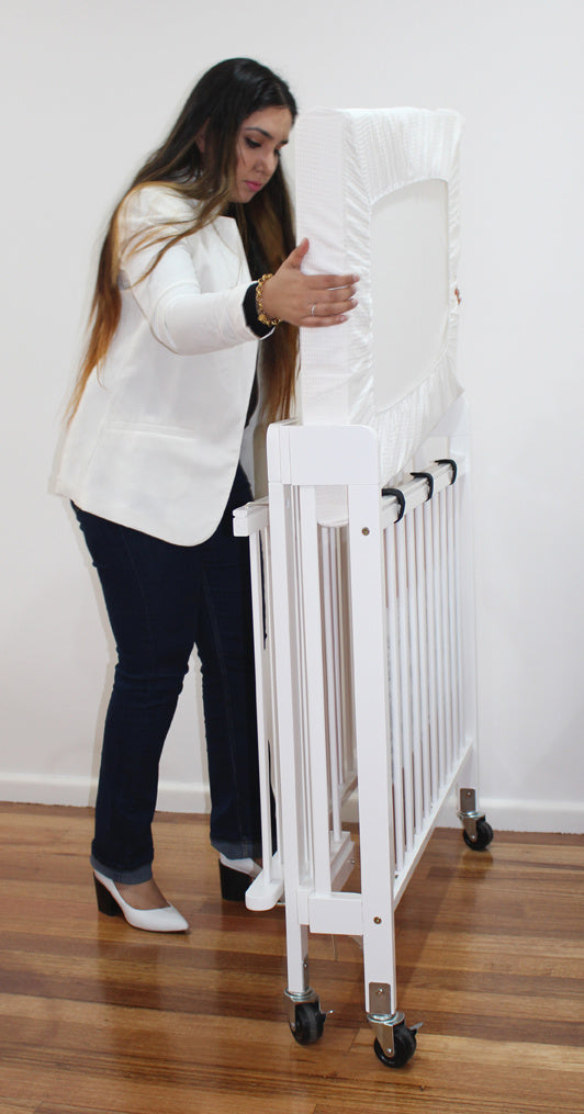 Baby Inc Stowaway Foldable Wooden Cot-White(N9608)